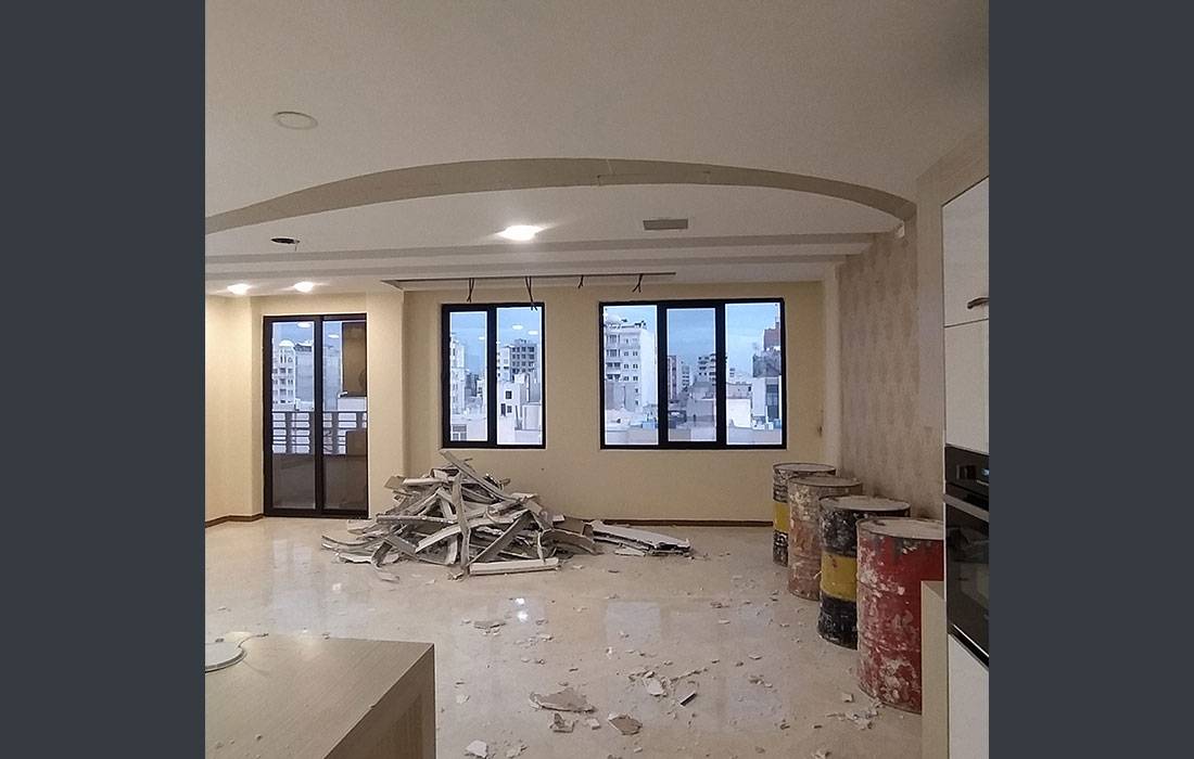Neoclassical living room with custom TV wall and ceiling design