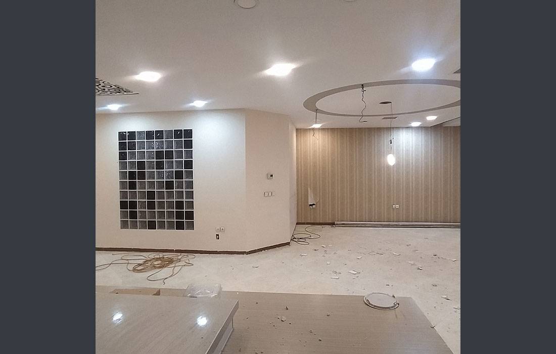 Neoclassical living room with custom TV wall and ceiling design